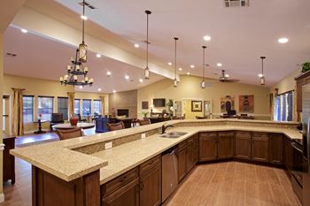 Clubhouse with Graceful Kitchen Area at Sky Court Harbors at The Lakes Apartments, Las Vegas, NV, 89117